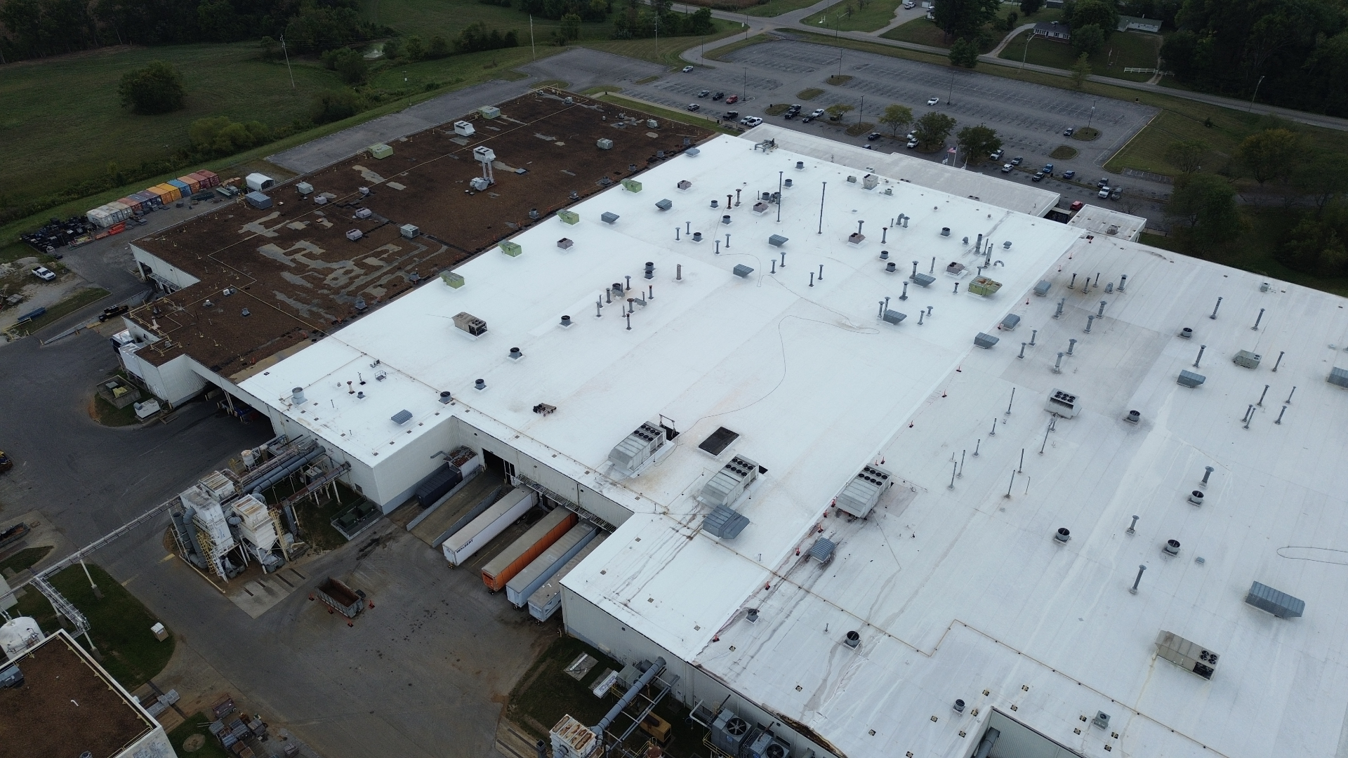 Aerial view of the completed mechanically attached TPO re-roof at an industrial auto parts manufacturing plant in Glasgow, Kentucky.