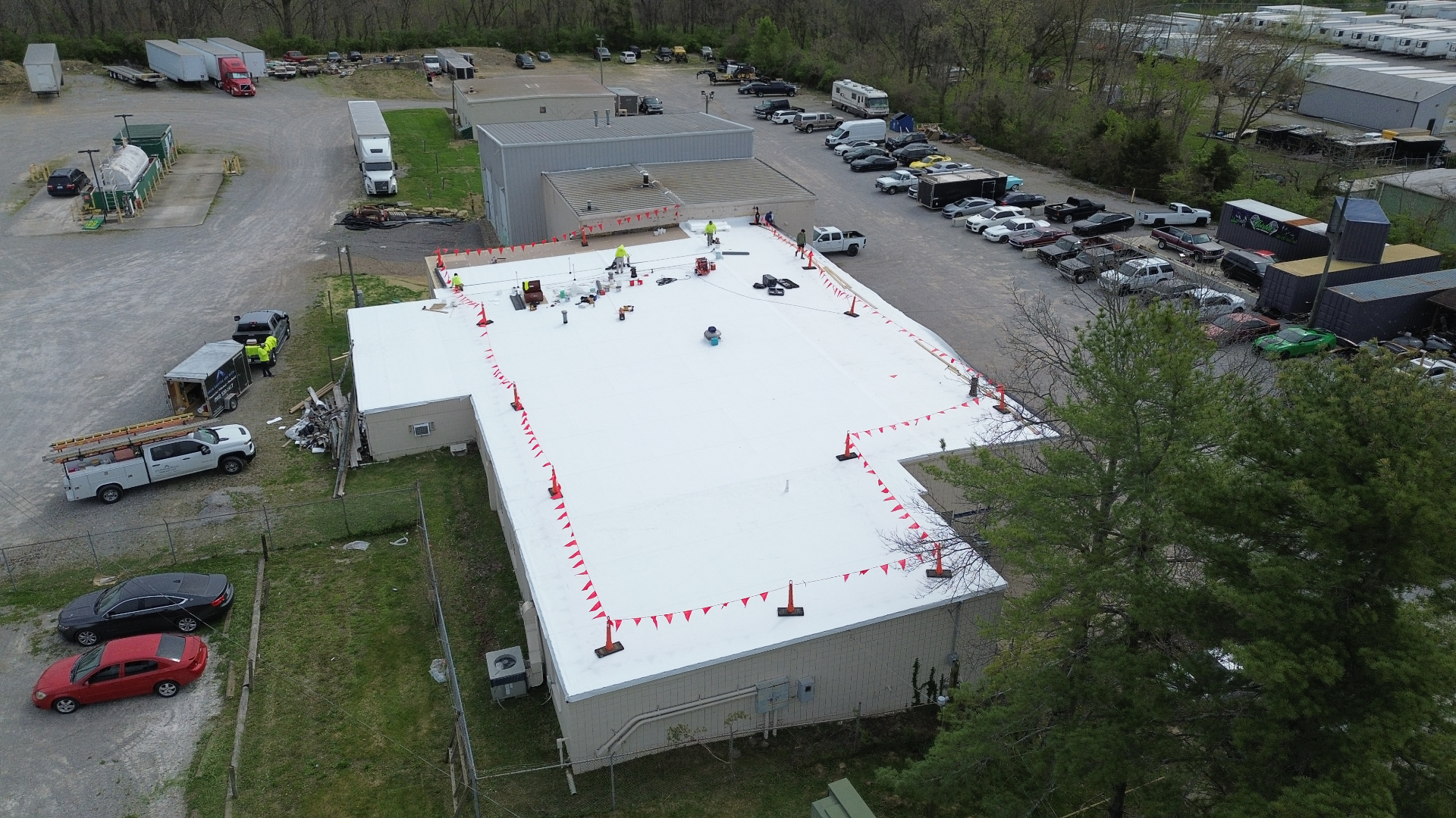 Completed 60-mil TPO roof system at Performance Auto Garage in Louisville, Kentucky.